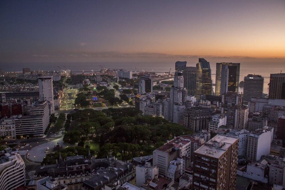 sunset along the beach with drift wood, high res